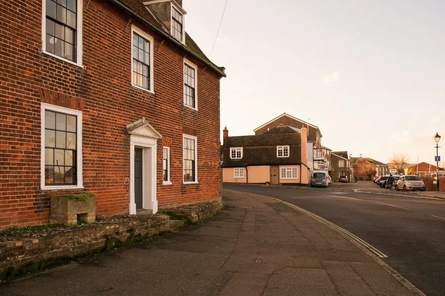 Georgian red brick house on a street corner