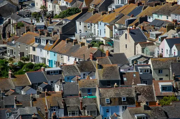 Hillside packed with the rooftops of terraced houses